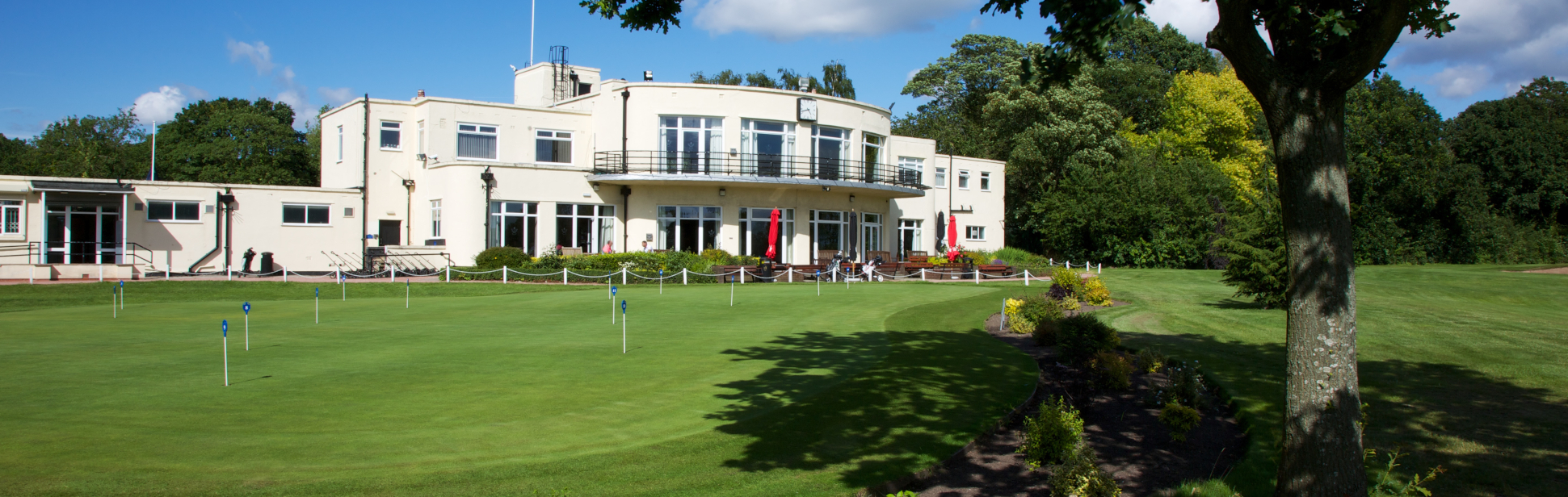 Art Deco clubhouse and putting green at Childwall Golf Club